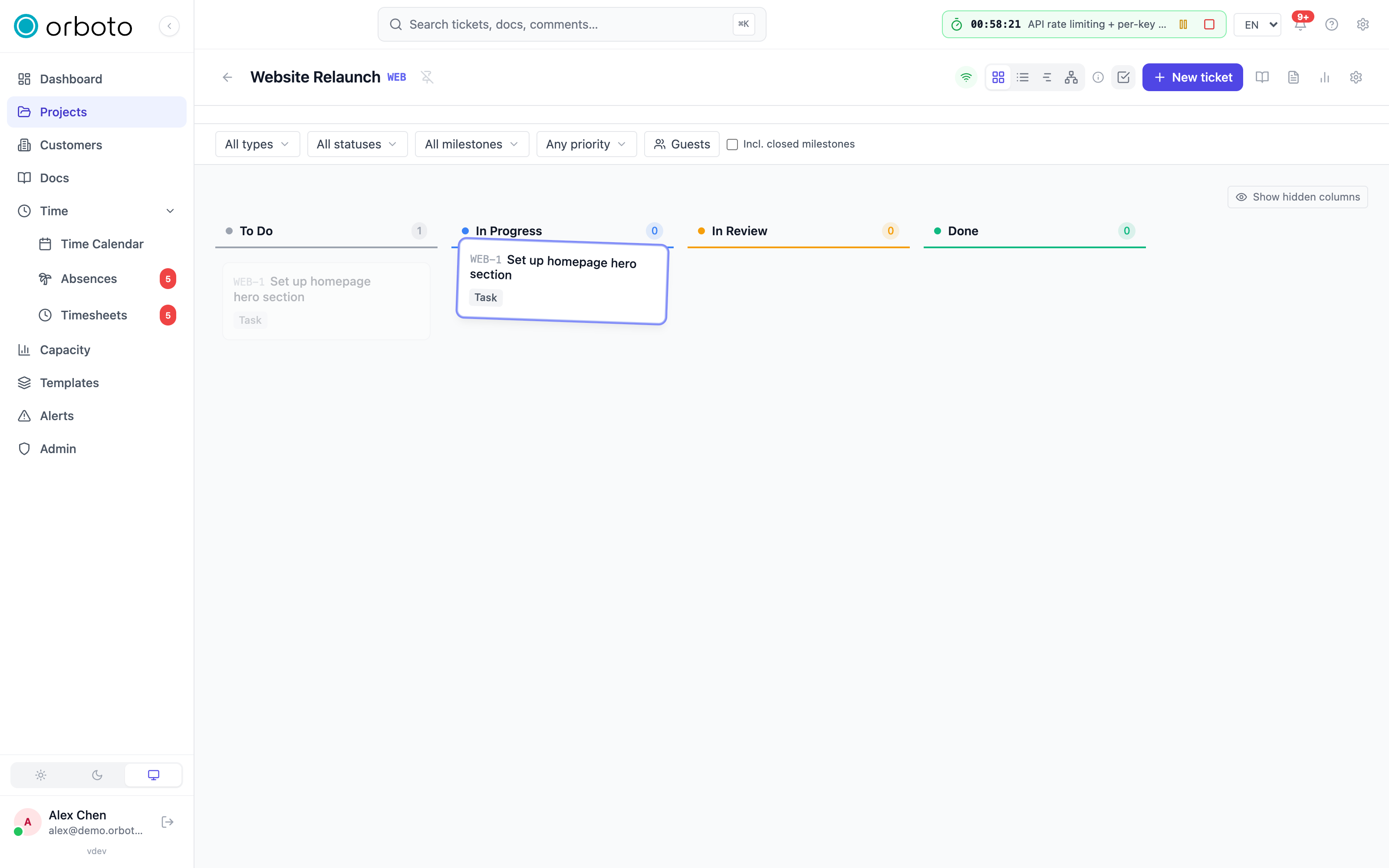 Dragging a ticket card between status columns on the Kanban board